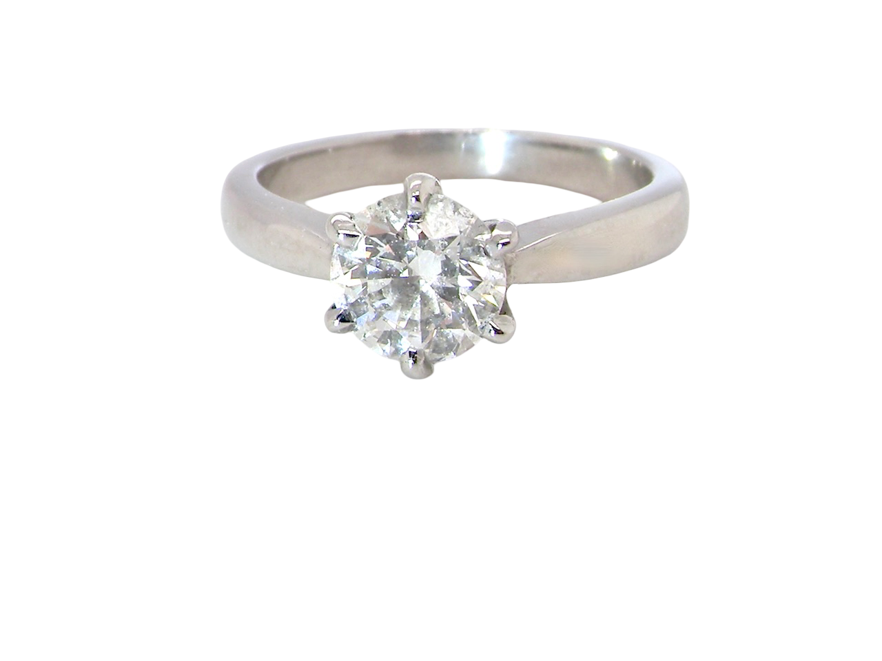  iconic solitaire ring. Features an impressive brilliant cut white diamond. 
