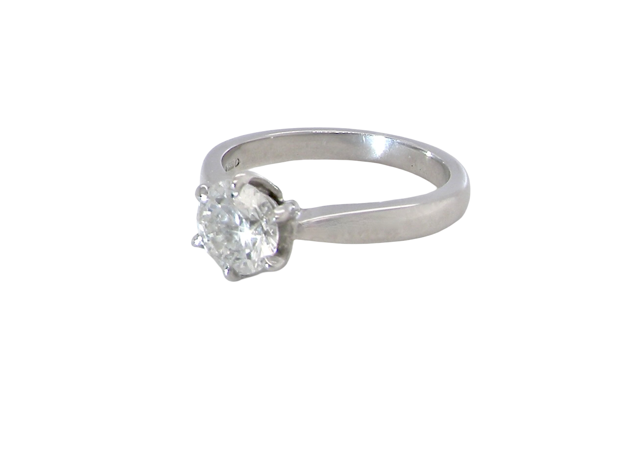  iconic solitaire ring. Features an impressive brilliant cut white diamond.  side