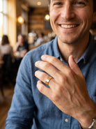 male hand A wide wedding ring 8mm, with a flat profile (not D shape) . Totally plain and re-polished to near perfect condition.