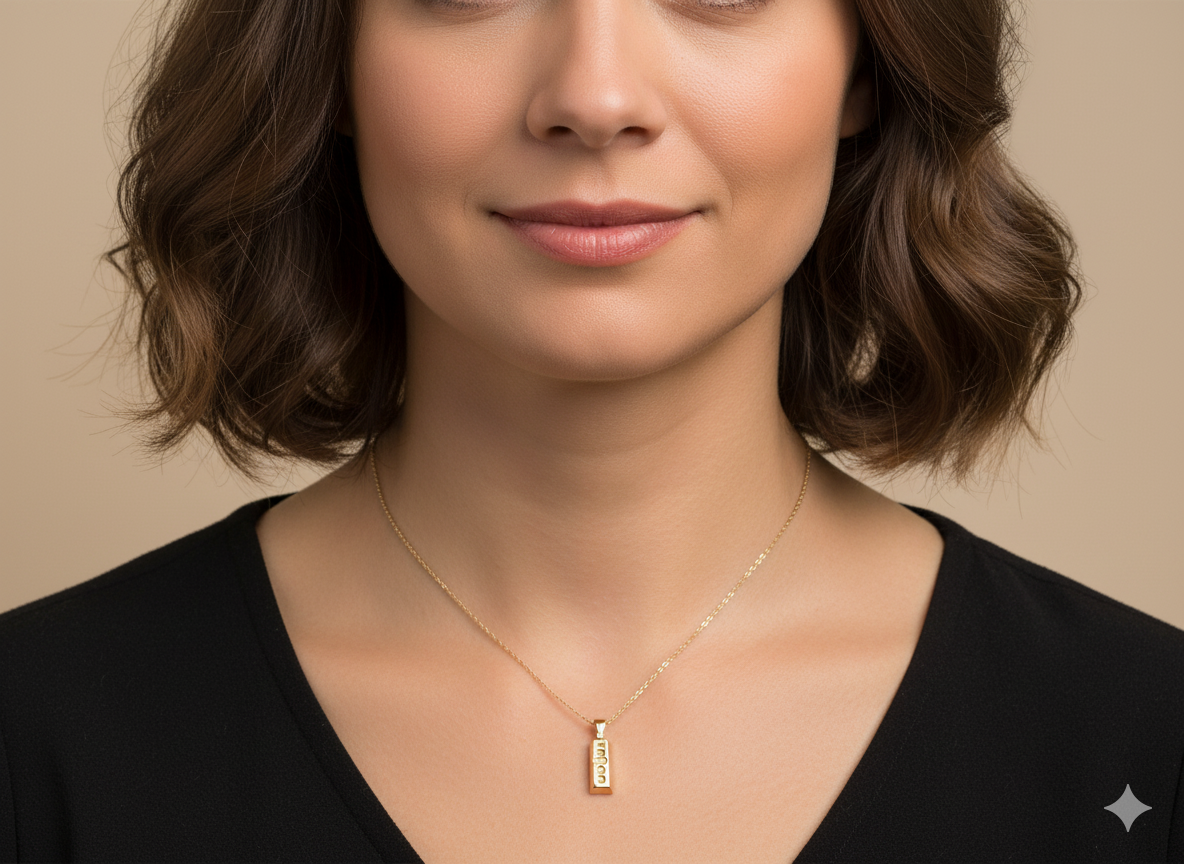  A 9 carat Yellow Gold Ingot Pendant &amp; Chain 