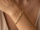 model A 9 carat gold chain bracelet. Links are curb style, diamond cut, each link 8x7mm.