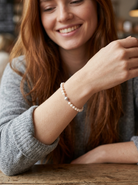 model A cultured pearl bracelet. High quality pearls, each 6.5mm, blister free, pink cream colour.
