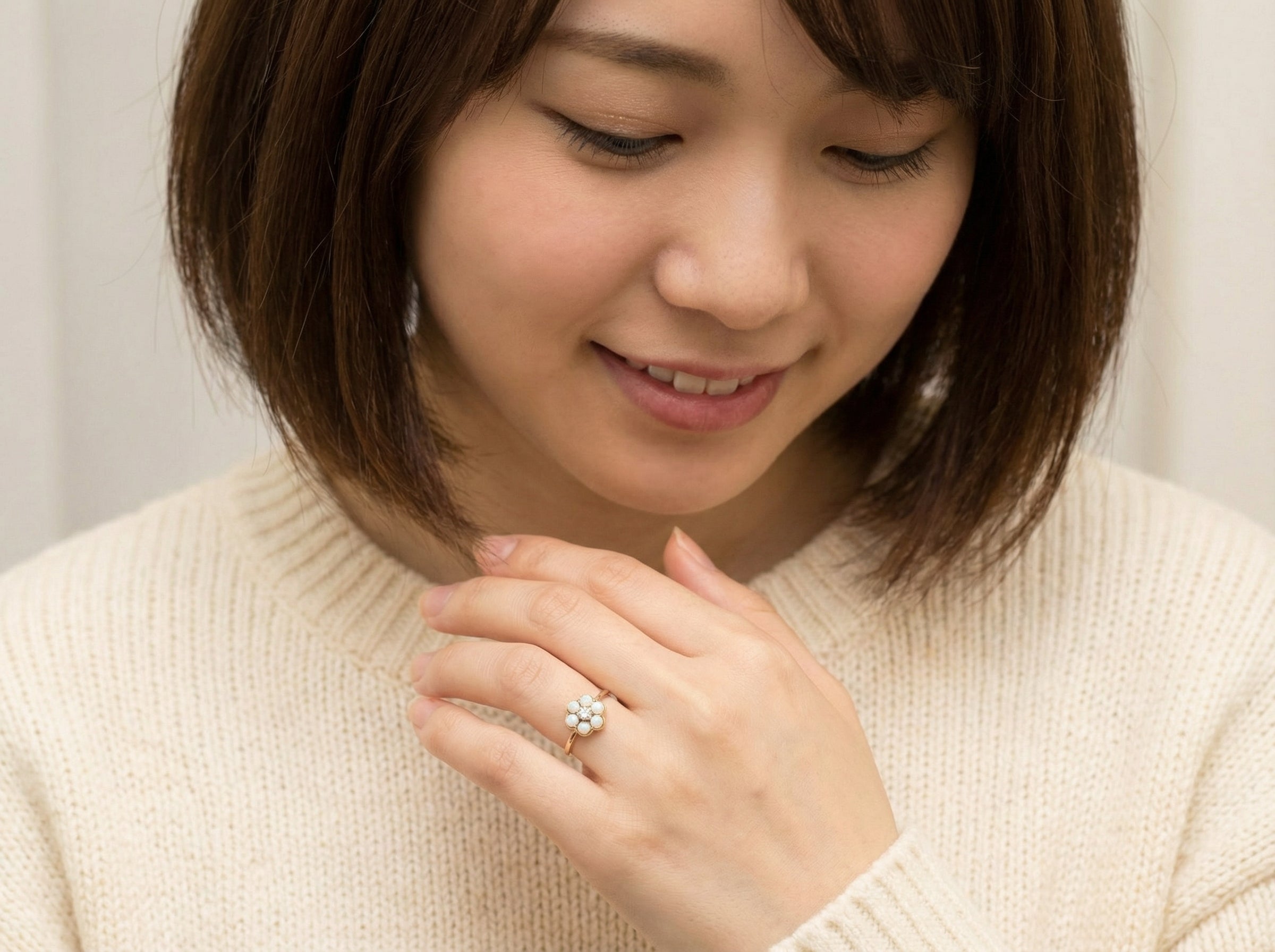 model A daisy cluster dress ring. Set with a small diamond centre stone, diameter 3mm (0.10 carats)
