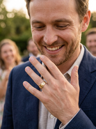 model A fine 18 carat gold buckle ring set with small old rose cut diamonds