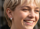 model A fine pair of cuff style hoop earrings. The front part is 18 carat white gold * set with seven small white diamonds, e