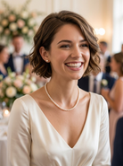 bride wearing A single row of cultured pearls with silver clasp