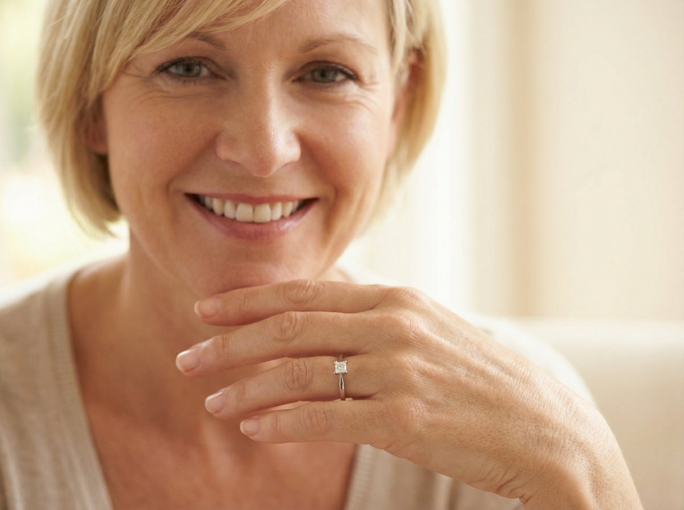 model An 18 carat white gold solitaire ring that features a Princess Cut white diamond. Measures 4x4mm,&nbsp; (est 0.30 carats). Colour I-j, clarity Si
