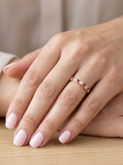 model An 18 carat yellow gold half hoop eternity ring. Set with four rubies, 3mm each.&nbsp;

Set with alternate diamonds, each 3mm (0.10 carats each) colour i-j, clarity Si.

