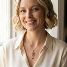 model An Edwardian pendant set with two amethyst gemstones