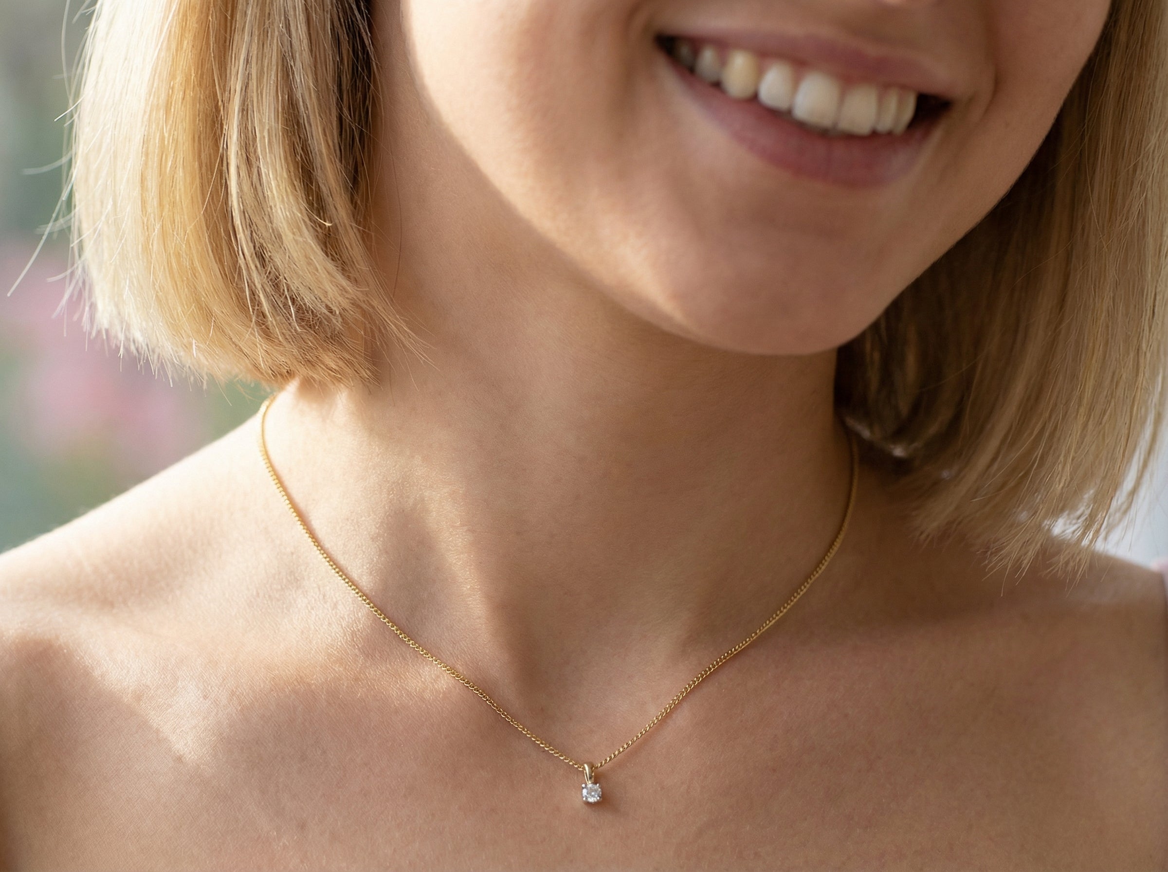 model Elegant and timeless, this solitaire diamond pendant showcases a beautifully cut 4mm round brilliant diamond, weighing 0.25 carats. The diamond features a bright H–J colour and Si clarity