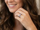 model beautiful and eye-catching dress ring set in 14ct white gold, featuring five triangular tanzanite gemstones