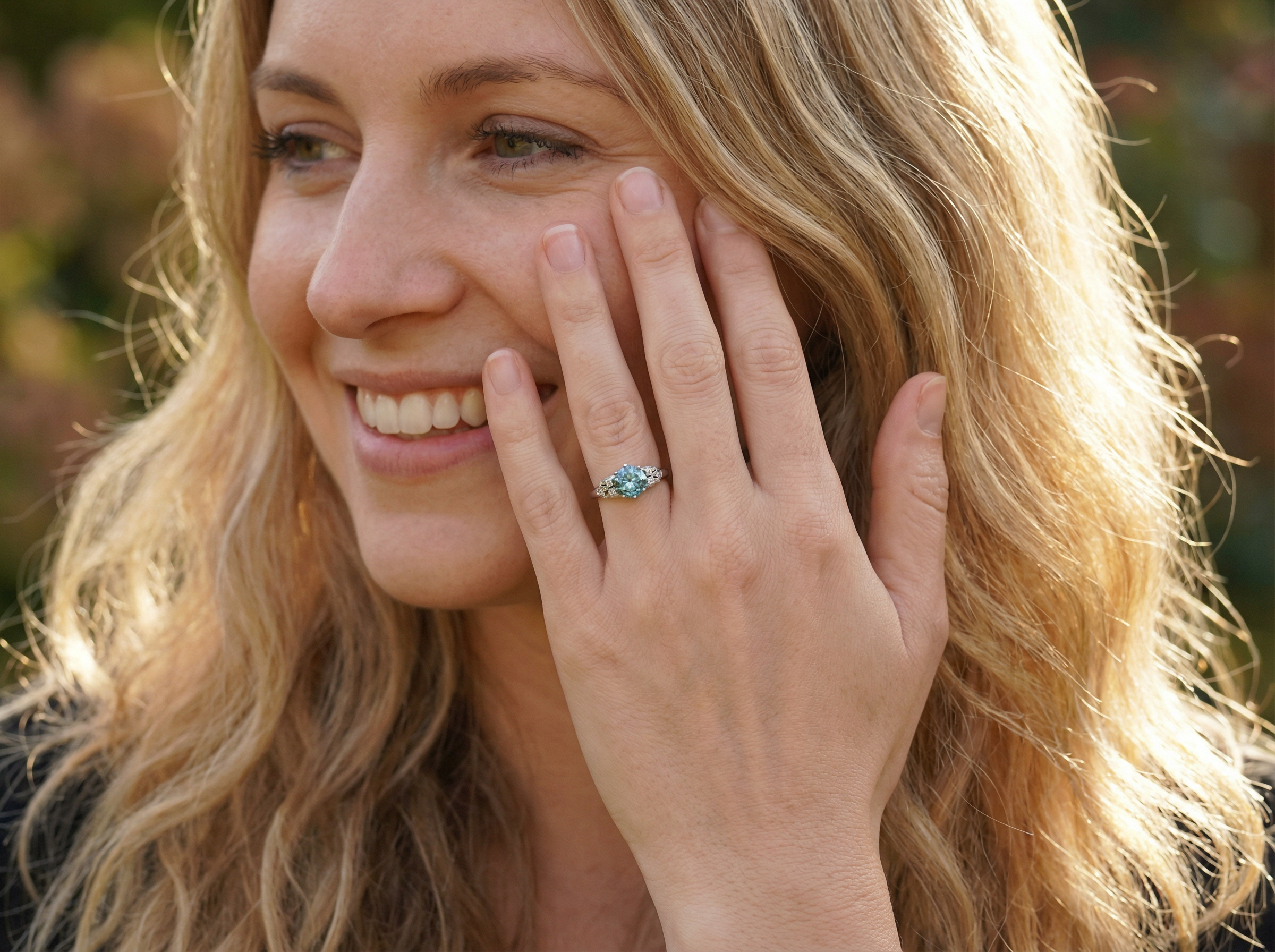model  fine Art Deco ring that features a stunning natural blue zircon centre stone 