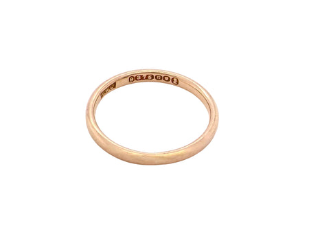 A narrow 9 carat gold wedding ring. D shape profile.

Width just over 2mm, weight 2 grams.
