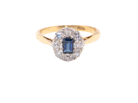  1970s cluster ring featuring a&nbsp;rectangular-cut sapphire,