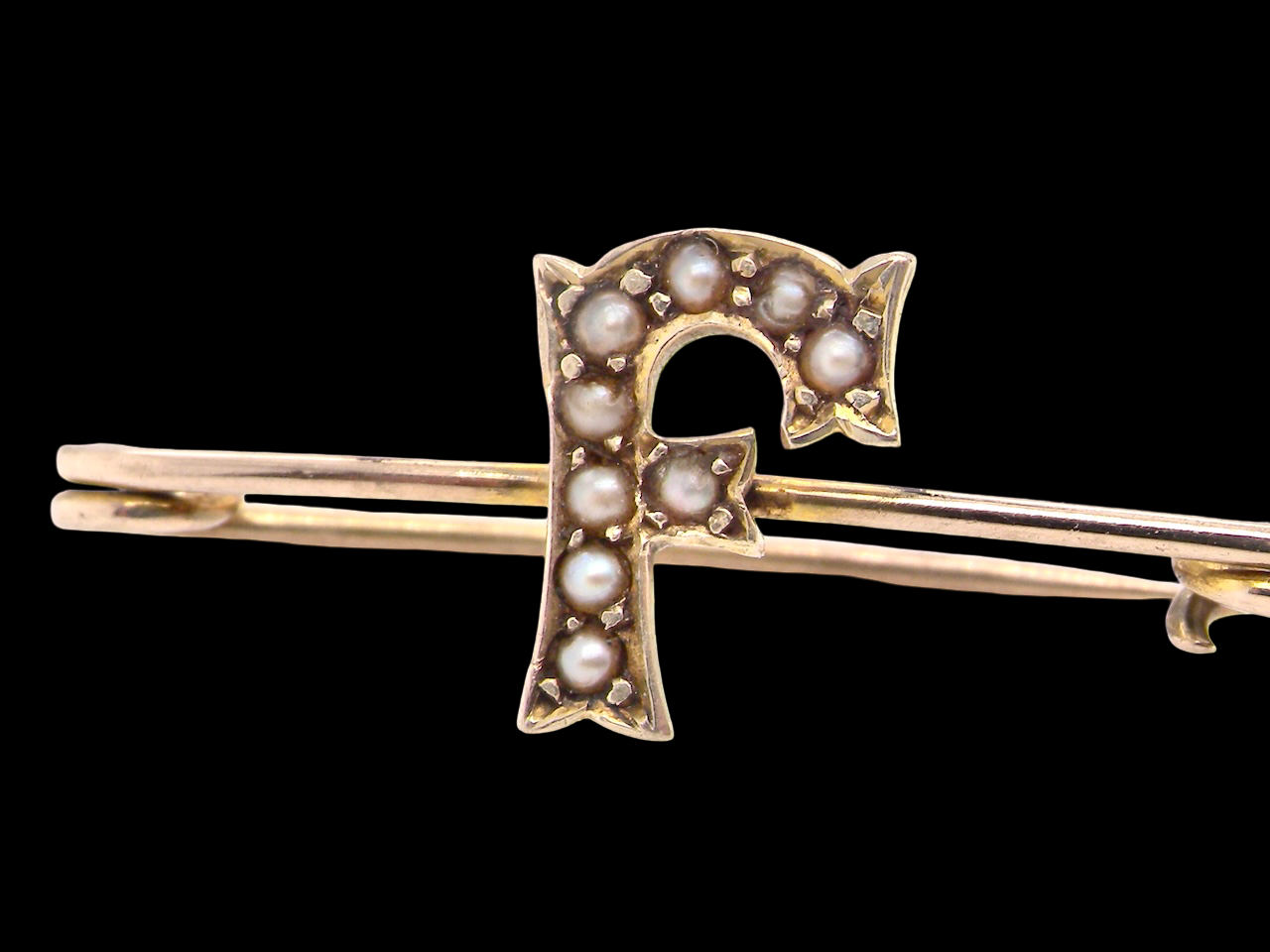 initial brooch