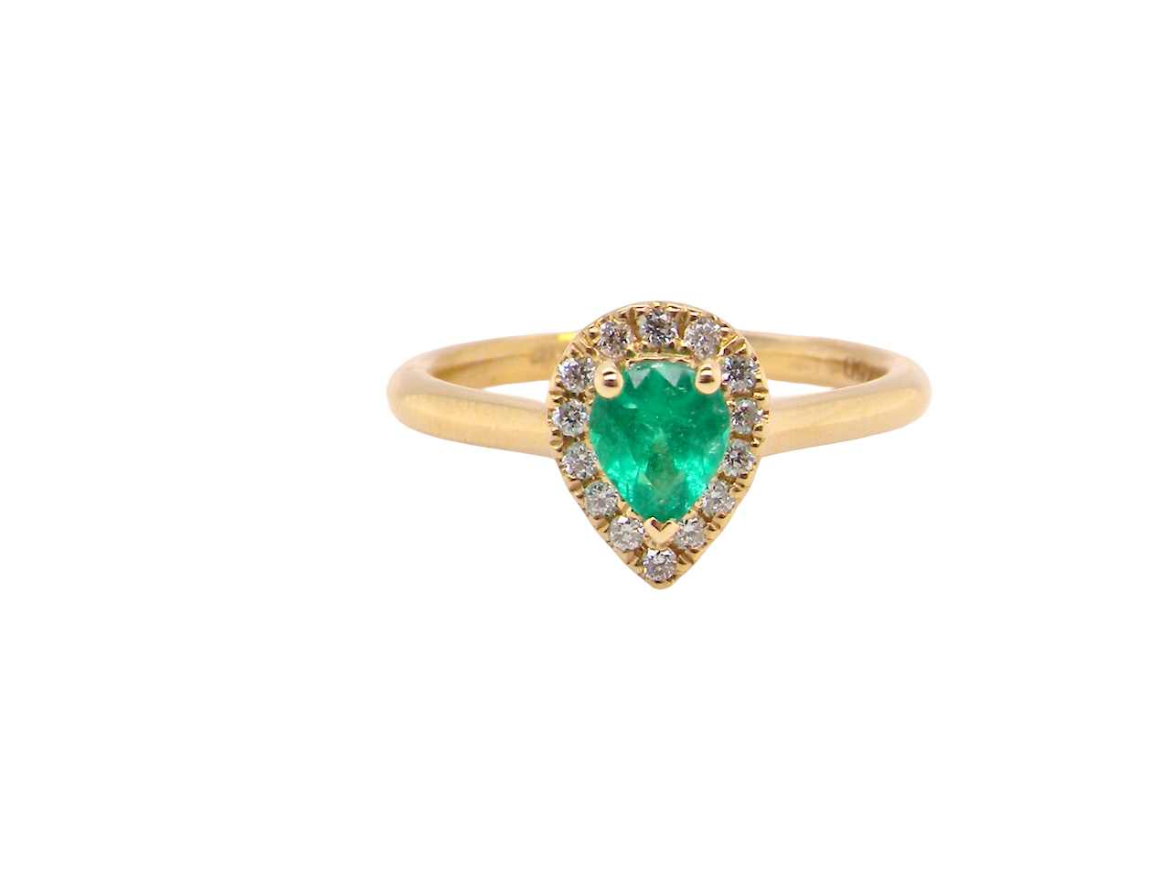 A new pear shaped Emerald and Diamond ring