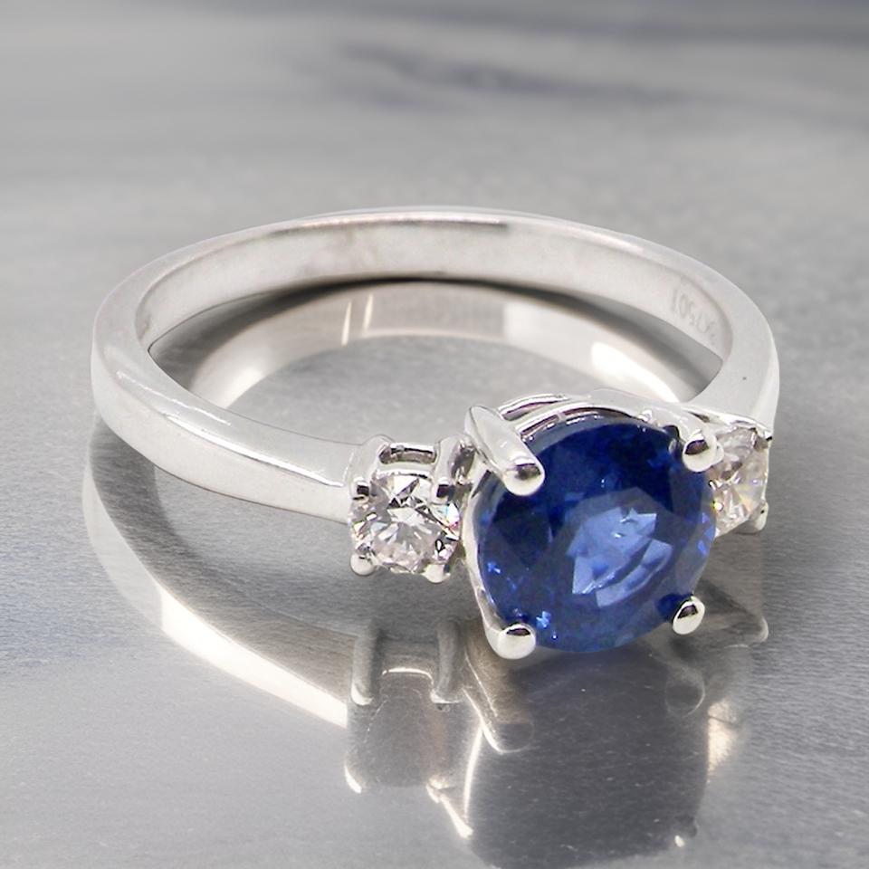  three stone Sapphire and Diamond Ring