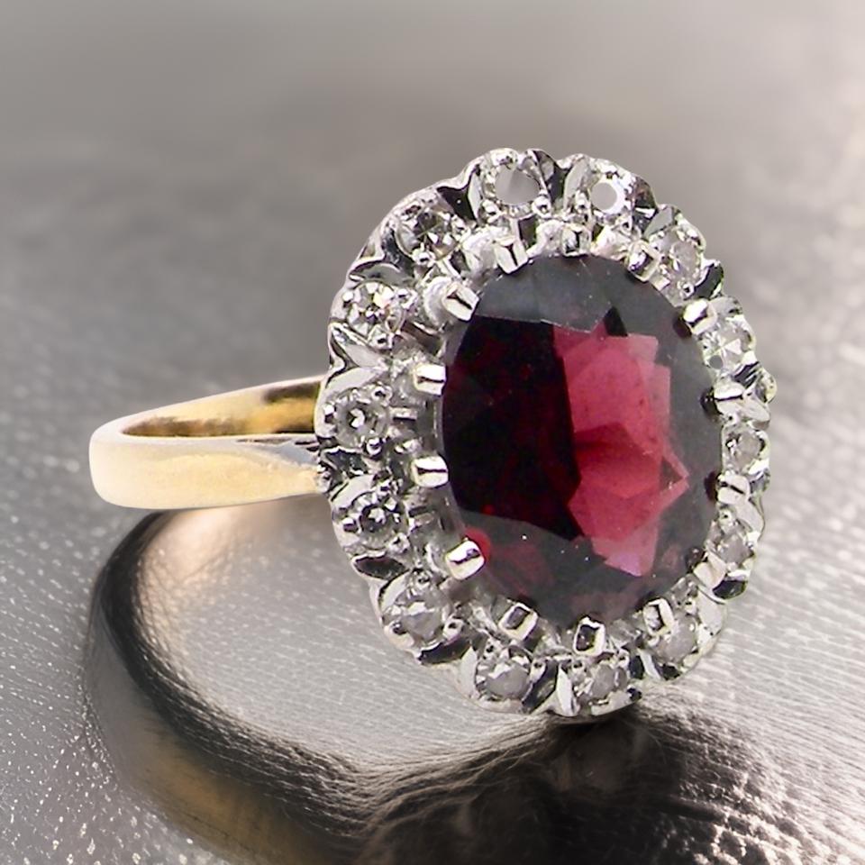 A Garnet and Diamond  Ring