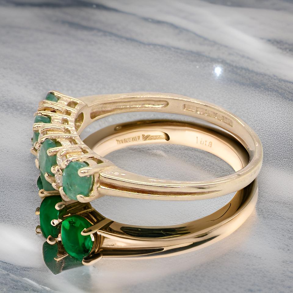 An Emerald and Diamond Ring side view