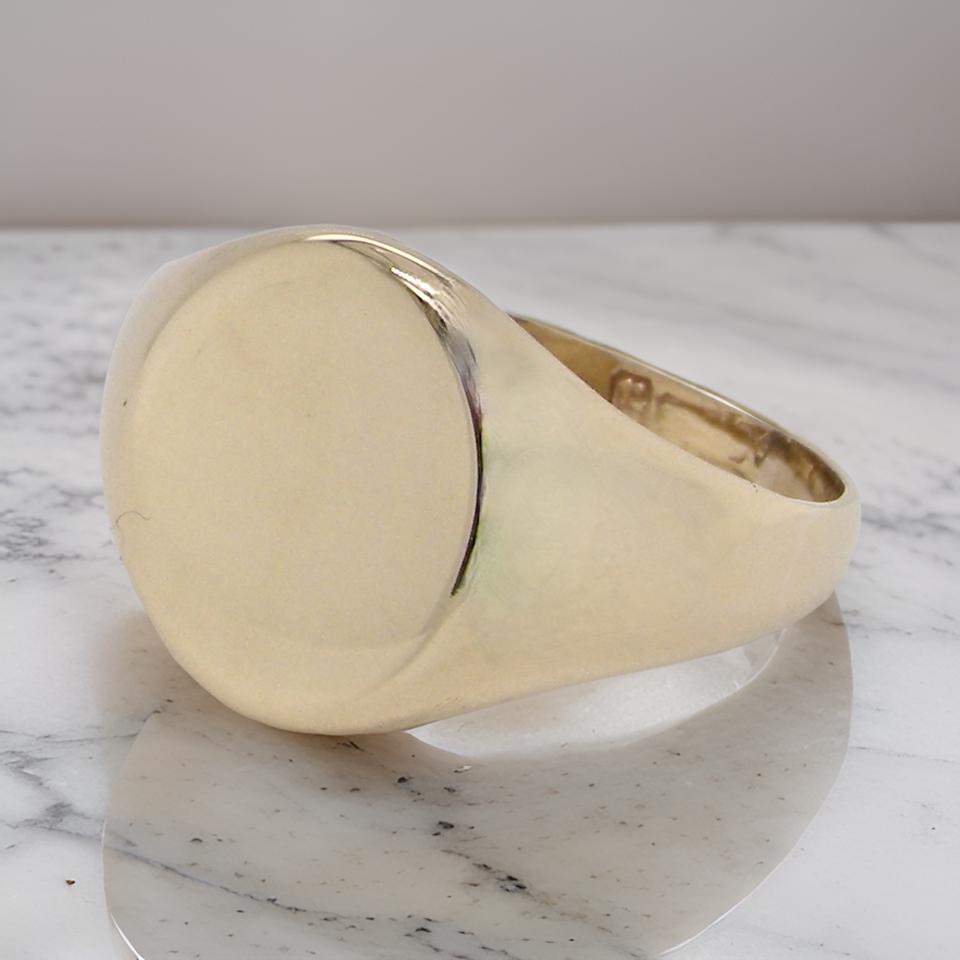 man's plain signet ring