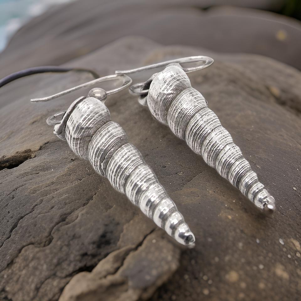 A pair of silver shell earrings