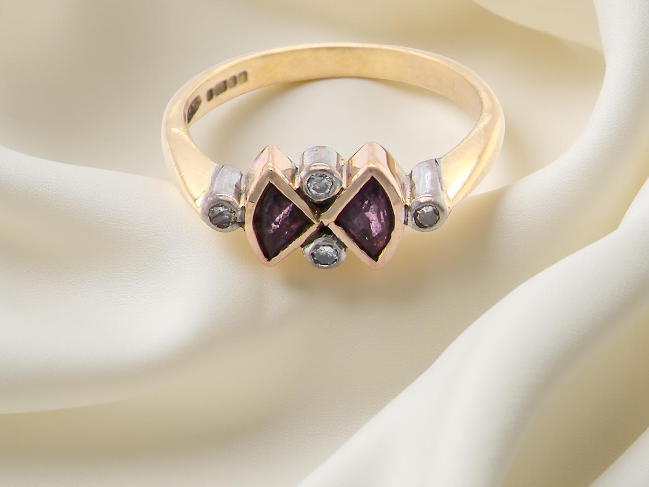 A pink tourmaline and diamond ring