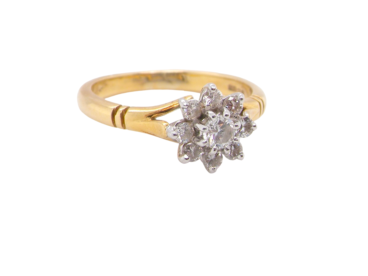 pretty cluster ring set with brilliant-cut white diamonds.
