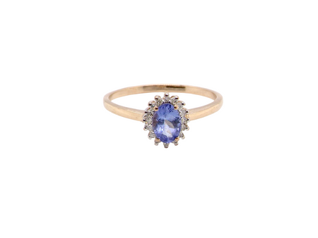pretty cluster ring that features an oval cut tanzanite gemstone,