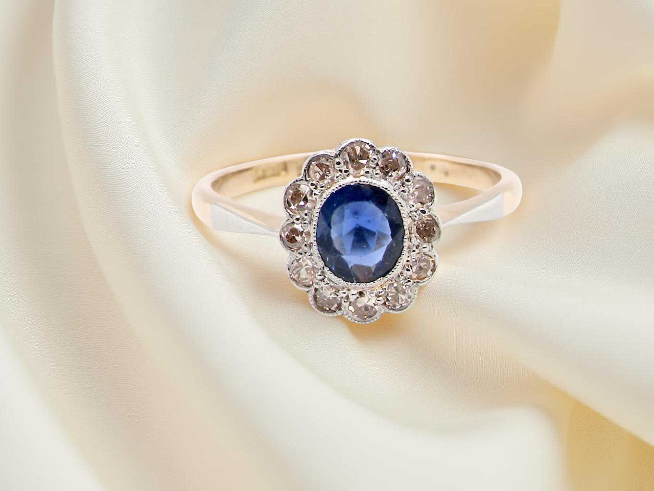 A pretty vintage Sapphire and Diamond cluster ring