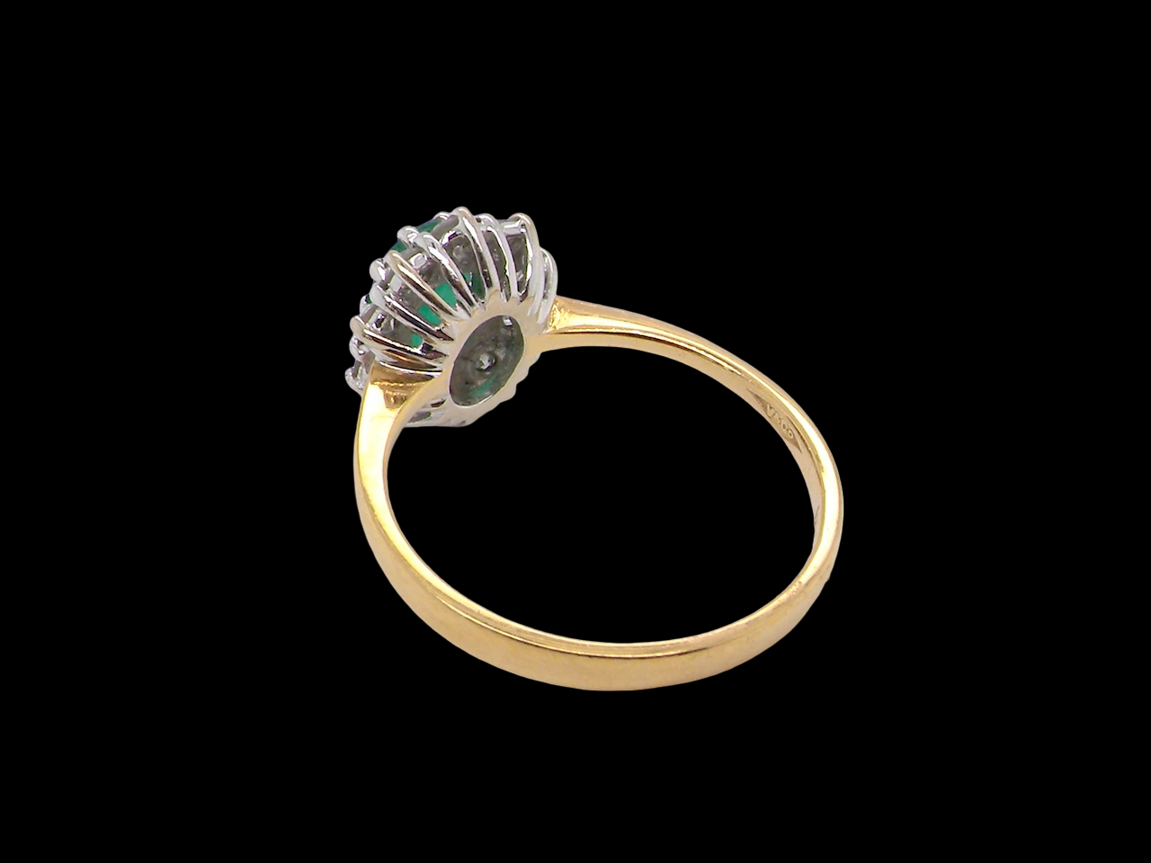 A 1980s traditional Emerald and Diamond Ring