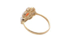 rear A 9 carat gold cluster ring. Centre stone an oval shaped coral stone 6x4mm.
