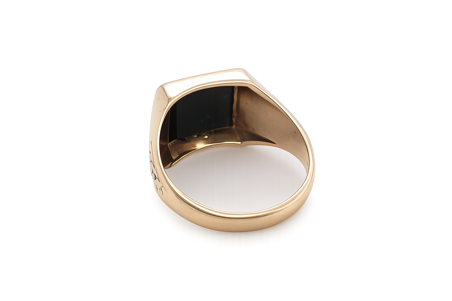 rear A 9 carat gold signet ring. Features a square cut black onyx stone, 10x10mm (est) .
