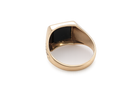 rear A 9 carat gold signet ring. Features a square cut black onyx stone, 10x10mm (est) .
