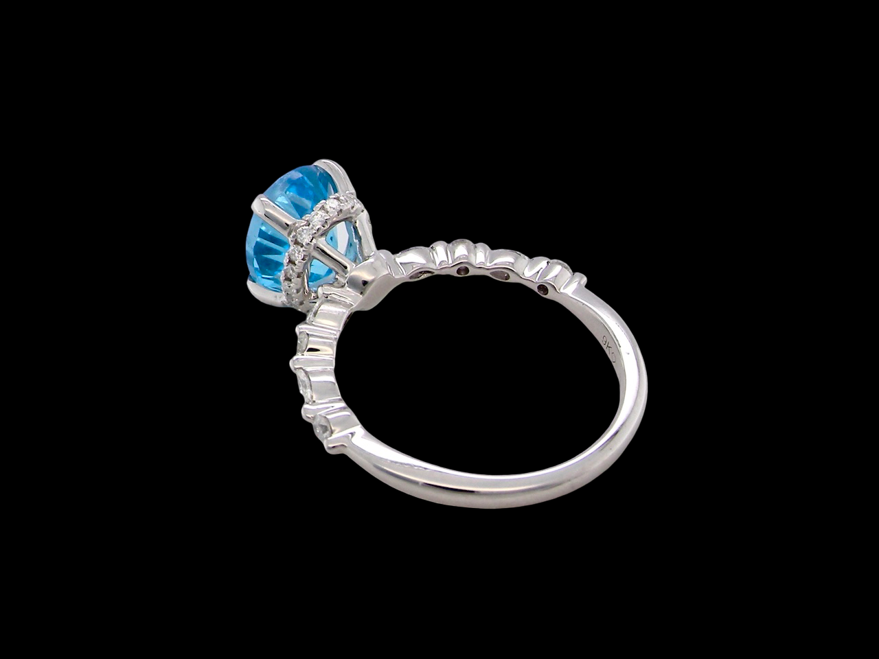 rear A NEW ring- but with a gemstone that we have taken from an old ring that was worn out, so its a new lease of life!&nbsp; The topaz measures 9x7mm.