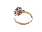 rear A beautiful vintage cluster ring showcasing a vivid pink sapphire centre stone, measuring approximately 6.6 × 4.3 mm(estimated 0.65 carats).