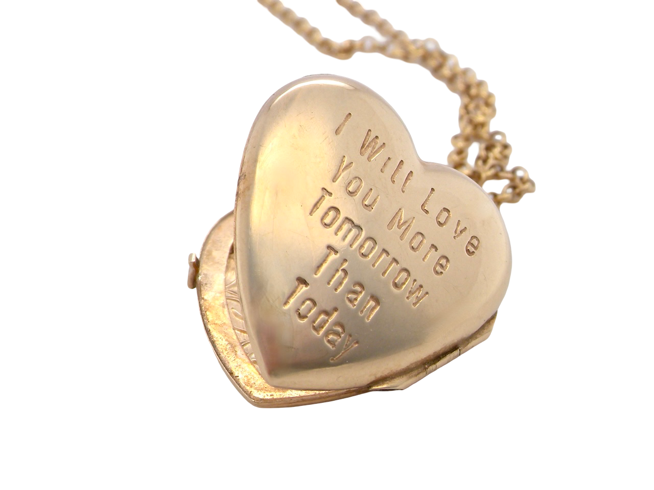 rear A charming heart-shaped locket, beautifully detailed with delicate scrolled engraving to the front. 