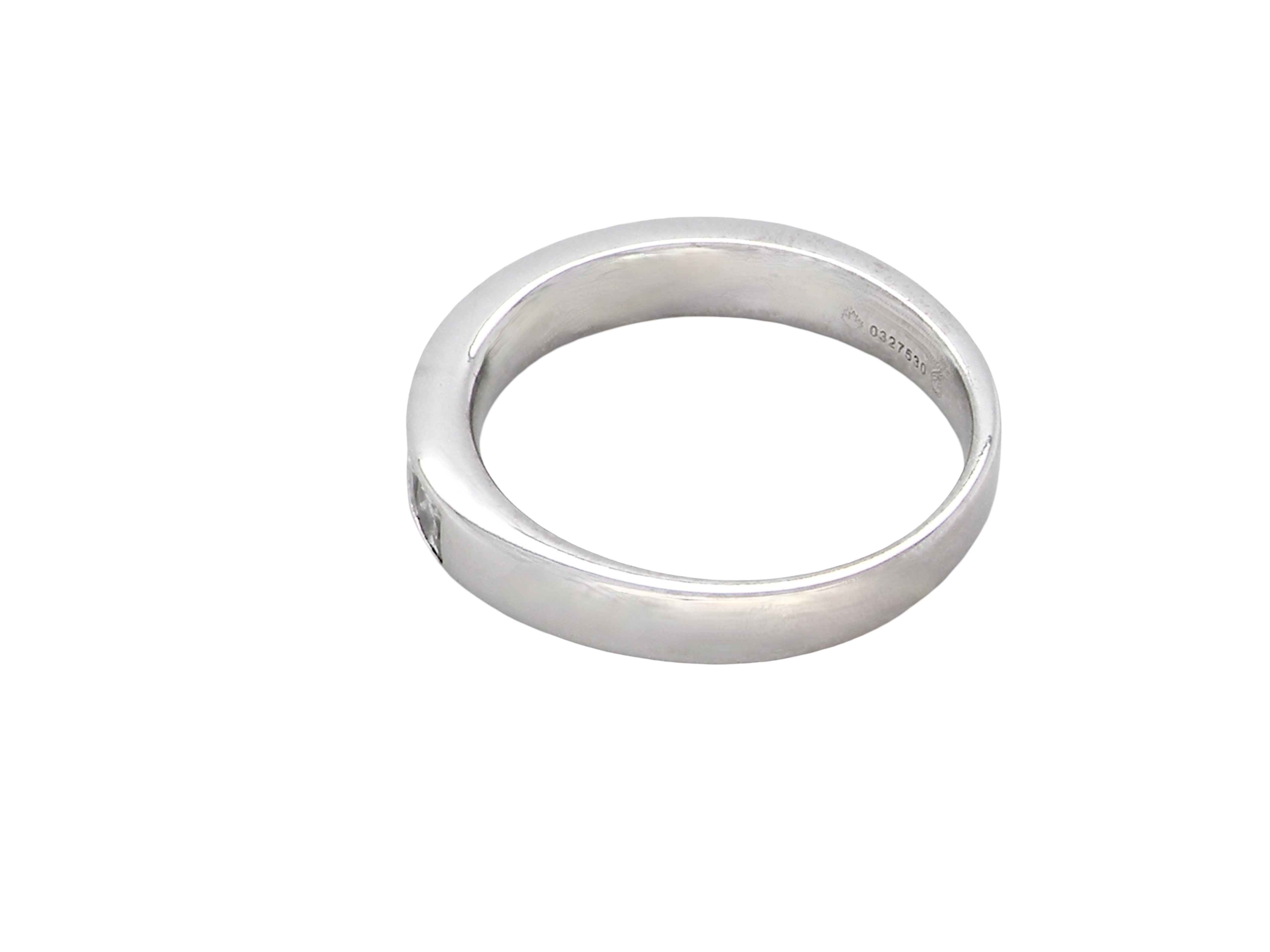 rear A fine 18 carat white gold half hoop eternity ring. Set with ten princess cut white diamonds.

Close set, each 2.5x2.5mm, total one carat