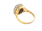 rear A fine cluster ring. Features a large garnet centre stone&nbsp;

Complimented by an outer halo of brilliant cut white diamonds.&nbsp;