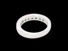 rear A fine platinum half hoop eternity ring. This is a new ring*. Channel set gem stones, five bright green emeralds 2.6mm each (0.54 carats total)