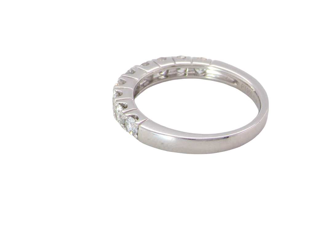 rear A fine seven stone half hoop platinum eternity ring, total measures 0.70 carats