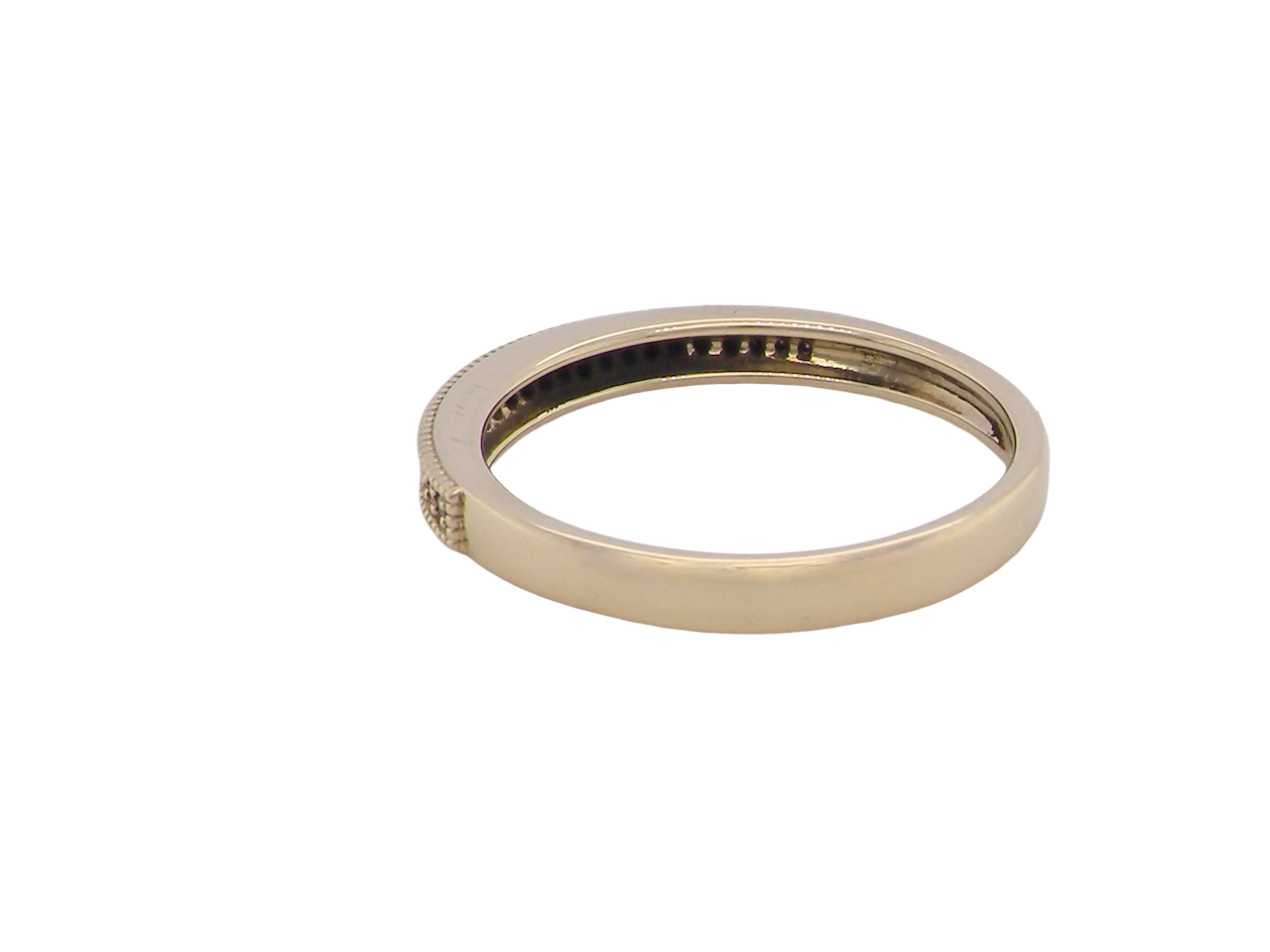 rear A half-hoop eternity ring set with approximately twenty-four white diamonds