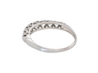 ring with a decorative openwork top band, photographed on a plain white background.