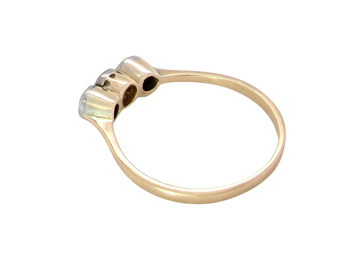 rear A mid to early 20th century trilogy ring set with three old brilliant cut white diamonds.

Each measures 4.4mm (est 0.33 carats each) 