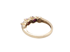 rear A pretty 9 carat gold dress ring. The three rubies are marquise cut, 5x3mm each, and set at an angle .