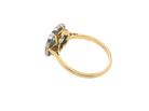 rear A pretty cluster ring. Features emeralds and diamonds. Centre stone a brilliant cut white diamond, measures 4mm (0.25 carats).&nbsp;
