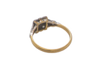 rear A pretty diamond cluster ring from the early part of the 20th century. A square head that has within it small white diamonds, measures 8x8mm, fancy shoulders also set with tiny diamonds.