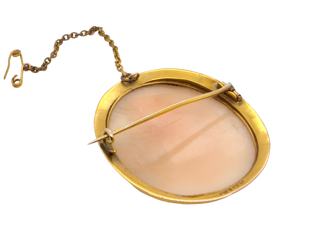 rear A timeless classic cameo brooch. The shell is hand carved&nbsp; with a classical Romanesque female figure.&nbsp;