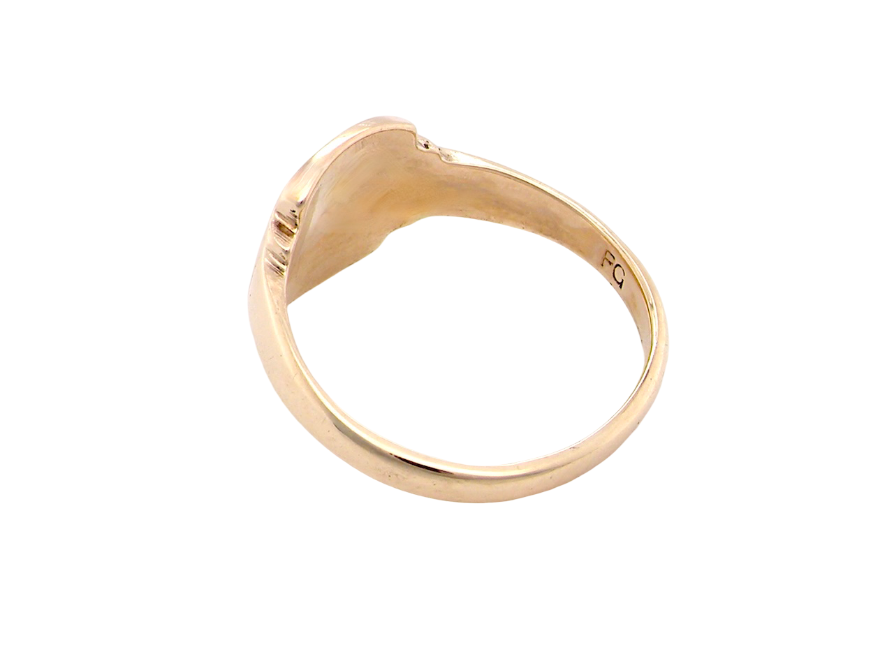 Gold ring on a white background