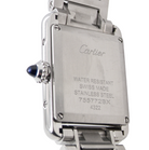 rear A womans stainless steel Cartier Tank Must wrist watch. Model number WSTA0051.

Silver coloured dial with Roman Numerals. Blue steeled hands. Case measures 29.5x22mm, case thickness 6.6mm. Quartz movement, synthetic sapphire button.
