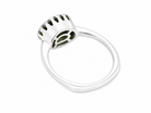 rear An 18 carat white gold* cluster ring. Features and oval shaped peridot gemstone, measures 8.5x6.5mm.

